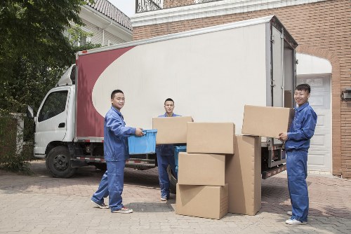 Man With Van Wapping team preparing a safe move with protective equipment