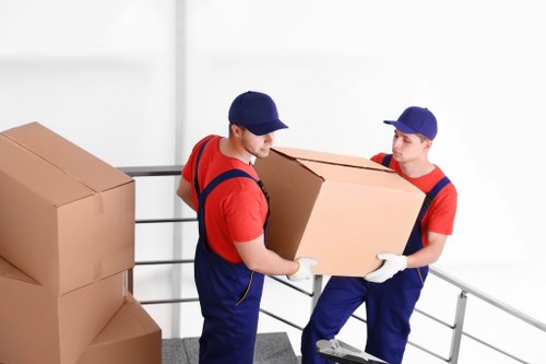 House movers preparing a move in Wapping near riverside apartments