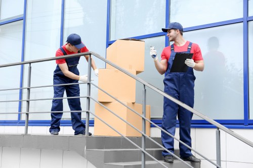 Removal team planning a home move in Wapping near riverside flats