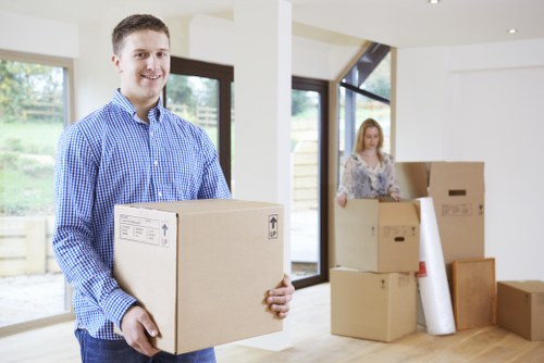 Unpacking boxes in a Wapping home after relocation