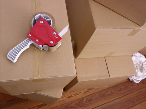 Packed boxes and furniture ready for a Wapping house move